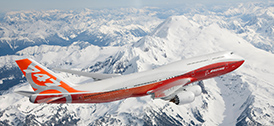 Render of 747-8 in flight over snowy mountains